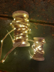 Ghirlanda luci di filo in juta su bobina in legno