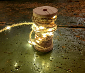 Ghirlanda luci di filo in juta su bobina in legno
